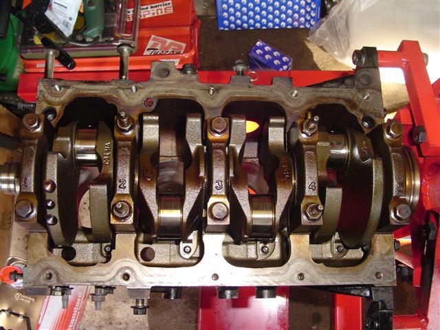 crankshaft & main bearing caps fitted in block